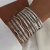 Moda Europea y Americana Nuevo Estilo Moda Personalizada Grabado Trenzado Geométrico Multicapa Apilados Pulseras Set de 10 Piezas Accesorios Al por Mayor