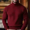 Nuevo suéter de punto elástico de moda para hombre en stock para comercio exterior transfronterizo, suéter de cuello alto de color sólido con rayas verticales, corte slim europeo y americano