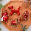 O novo pingente de PC de árvore de Natal vermelha pintada da Shengyuan para decorações de Natal DIY e penduricalhos de janela está disponível para atacado.
