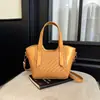 Bolso de Mujer de Alta Moda para el Trabajo 2026 Otoño Temprano Nuevo Bolso Cubo Relajado Bolso de Mano de Moda Bolso de Hombro