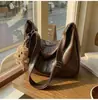 Bolsa Transversal Retrô Design de Nicho Feminina 2026 Nova Estilo Coreano Bolsa Tote Moda Versátil Grande Capacidade Bolsa de Ombro