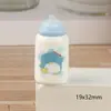 Simulación tridimensional de dibujos animados, botella de leche, pegamento de crema creativo, hecho a mano, DIY, paquete de materiales para accesorios de joyería de resina, venta al por mayor