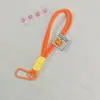 O49 Mochila de Exterior Chaveiro de Corda Cordão Trançado de Nylon Mosquetão Pulseira de Pulso para Casal Cordão para Bolsa Tendência