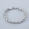 Botón de Oro de 18K Cadena de Cuerda Pulsera de Acero de Titanio Fabricante Mayorista Acero Inoxidable Patrón de Rejilla Retorcida Cadena Pulsera para Hombre Moda Tendencia