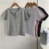 Elegante camiseta de manga corta con tapeta en V para mujer, de algodón, corte ajustado, adelgazante, camiseta corta versátil casual de verano, nuevo estilo