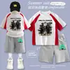 Nuevo Set Infantil de Primavera Delta Action Weilong Ha Jifeng Conjunto de Dos Piezas de Verano con Pantalones Cortos de Manga Corta para Niños Conjunto de Moda