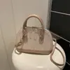 Parche Tejido 2026 Primavera Nueva Moda Tendencia Simple Versátil Bolso de Hombro Cruzado Bolso de Concha