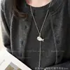 Colar de Peixe Retrátil Prateado para Mulheres, Design Simples e Versátil de Nicho, Acessórios de Inverno, Corrente Decorativa Longa para Suéter