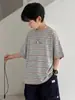 Camiseta de Manga Corta para Niños 2026 Nuevo Estilo Top Rayado Infantil Moda Verano Media Manga Venta al por Mayor para Niños
