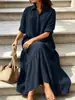 Vestido casual de estilo perezoso para mujer, de color liso, con cuello de camisa, diseño de botón trenzado y bajo con volantes, para uso transfronterizo.