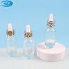 Botella de líquido Essence nueva 30ml gotero de cabeza de plástico botella de aceite esencial fondo grueso botella de líquido de vidrio líquido para la piel sub-botella