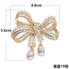 Broche de Broche com Pingente de Pérola e Laço de Luxo Leve Europeu e Americano Novo Acessório de Moda Pin de Temperamento Exquisito para Terno de Mulher