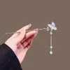 Exquisita Pinza para el Cabello con Borla de Mariposa Azul Cristalino de Nicho para Mujer 2025 Nuevo Estilo Antiguo Pinza Diaria para el Cabello