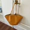 Bolso de mano tejido con textura simple y atmosférica estilo coreano para mujer 2026 Nuevo Pequeño de Nicho de Gama Alta para Viajes Diarios Bolso de Hombro Único