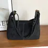 Bolso tote de hombro cruzado casual y versátil de gran capacidad, nuevo diseño de moda otoño 2026, estilo coreano moderno
