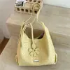 Bolso de mano tejido de diseño nicho transfronterizo modelo nuevo 2026 bolso de hombro de gran capacidad bolso de mano versátil estilo coreano para ir al trabajo