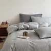 Juego de ropa de cama de cuatro piezas de algodón puro lavado Clase A, ropa de cama cepillada 100% algodón, funda de edredón, sábana, juego de tres piezas para dormitorio, sábana ajustable