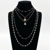 Cadena de Perlas Oceánicas de Venta Caliente Transfronteriza Europea y Americana Cadena para Clavícula de Mujer Colgante de Estrella de Mar y Concha Collar Multicapa Apilable Venta al por Mayor