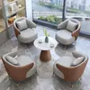 Juego de mesa y sillas de negociación para oficinas de ventas de hoteles, silla de recepción y reunión de lujo ligero, sillón individual minimalista de ocio para salones de belleza