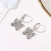 Nuevos pendientes europeos y americanos de moda con forma de mariposa y diamantes, elegantes y elegantes pendientes de mariposa, accesorios de fábrica.