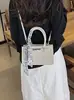 Bolso Versátil de Moda Verano 2026 Transfronterizo Bolso Pequeño Cuadrado Bolso de Hombro Bolso Cruzado de Nicho de Alta Gama