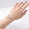 Nuevo brazalete con colgante de corazón transfronterizo europeo y americano para mujer, exquisito brazalete en capas de cadena de labios, joyería de moda con cuentas para el día a día
