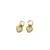 [Acero de titanio de cuerpo completo] Pendientes de viento minimalistas con diseño de concha, pendientes fríos para hombres y mujeres, pendientes de banquete con temperamento y personalidad