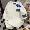 2026 Nova Camiseta Manga Curta Marca Tendência Retrô Simples Gola Redonda para Mulheres Roupa de Trabalho Verão Casual Solta Estilo Casal Top