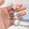 Cuerda para teléfono móvil J85 gatito de saludo colgante de bola de pelo con cuentas corazón de chica dulce cadena para teléfono móvil colgante de gato de dibujos animados