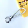 Chaveiro de corda trançada com anel duplo chaveiro de couro PU colorido novo pingente para bolsa feminina chaveiro para pendurar na cintura