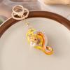 Nuevo llavero creativo de serpiente del zodiaco con incrustaciones de diamantes en color, colgante para bolso, regalo pequeño