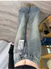 Jeans Azules Estilo Americano con Patrón de Nudo de Bambú Micro-Acampanados para Mujer Primavera Otoño 2026 Nuevo Lavado Desgastado Adelgazantes No Ajustados a la Pierna Pantalones Acampanados