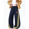 Pantalones Casuales Retro Americanos de Calle con Tres Rayas para Hombre Versátiles Holgados de Pierna Ancha Largos Estilo Perezoso Pantalones Casuales Scimitar para Hombre