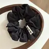 Lazo para el pelo de tela con diseño de anillo de intestino grueso plisado de color sólido simple, diseño de nicho, sujetador de coleta de alta gama, goma para moño, gorro para el pelo