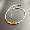Collar de cuentas de arroz con diseño de nicho, estilo bohemio, estilo retro transfronterizo europeo y americano, con cuentas de piedra natural y conchas. Cadena de clavícula corta.
