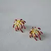 Tendencia Nacional Diseño de Nicho Rojo Retro Esmalte Circonio Fuegos Artificiales Latón Chapado en Oro Lujo Ligero Pendientes de Gama Alta para Mujer