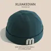 Gorro de bebé con letras de moda coreana para primavera y otoño, gorro fino de propietario para niños y niñas, protector solar para bebé, gorro de piel de melón yuppie para verano