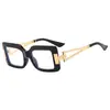 Gafas de ordenador de moda moderna transfronterizas europeas y americanas, caja retro, gafas anti luz azul, montura de gafas ópticas hueca de metal