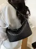 Bolso de mano liso súper popular transfronterizo para mujer, nuevo modelo 2026, diseño de nicho, bolso cruzado versátil de alta gama para el día a día