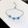 Pulsera de flor corazón de circón súper brillante estilo coreano, sensación de lujo ligero de alta gama, joyería versátil exquisita y elegante para el día a día de las mujeres