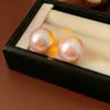 Pendientes Redondos Sencillos de Perla Aguja Plateada de Moda Versátiles para Viajes al Trabajo Pendientes Retro de Nicho Pendientes de Alto Temperamento para Mujer