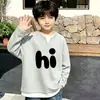 Nuevo top de punto gofre para niño, estilo dos piezas falsas, manga larga, para niños mayores y pequeños, estilo coreano, simple y versátil