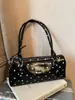 Bolsa de Mão/Ombro para Mulheres Design de Nicho Personalidade da Moda 2026 Novo Estilo Bolsa de Ombro de Alta Qualidade Versátil Bolsa Baguette Tendência