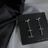 Pendientes largos de perla con forma de cruz de circón, modernos, sencillos, de estilo frío, dulces y frescos, con un diseño distintivo y sentido del humor.
