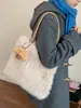 Bolso de mano de felpa de color liso y gran capacidad, nueva colección otoño 2026, bolso de hombro/bolso de axila casual, simple y elegante