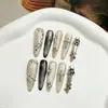 Uñas postizas de ojo de gato cruzadas hechas a mano con purpurina negra y plateada y diamantes, geniales y elegantes, realzan el tono de piel, piezas de uñas terminadas desmontables para uso diario