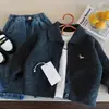 Cárdigan abierto estilo coreano para niños, nueva colección primavera/otoño 2026, top de punto liso unisex, suéter para bebé, prenda exterior de moda