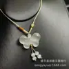 Colgante de mariposa de piedra ojo de gato al por mayor del fabricante, colgante de collar de candado rosa ojo de gato que cumple deseos, regalo de tienda de jade en zona turística