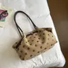 Bolsa de axila feminina estilo coreano, chique e discreta, coleção 2026, com um design de poá moderno, uma bolsa de ombro popular e estilosa