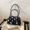 Bolso de axila de nicho estilo francés para mujer, nuevo bolso de lona de moda 2026 para el día a día, bolso de cubo con lunares para el hombro